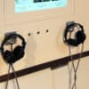 Old Style Armoured Cabled Headphone hangers installed at St Nicholas' Chapel